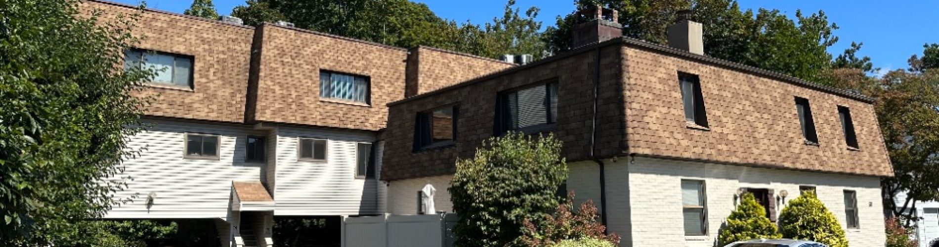 Tenant signing lease agreement with Wawe Property Management in Fairfield, CT